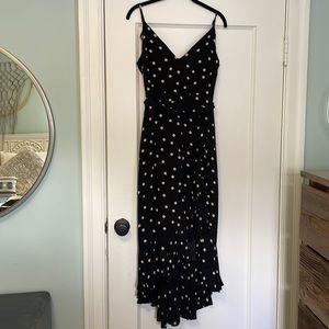 Polka dot dress with front ruffle & tie